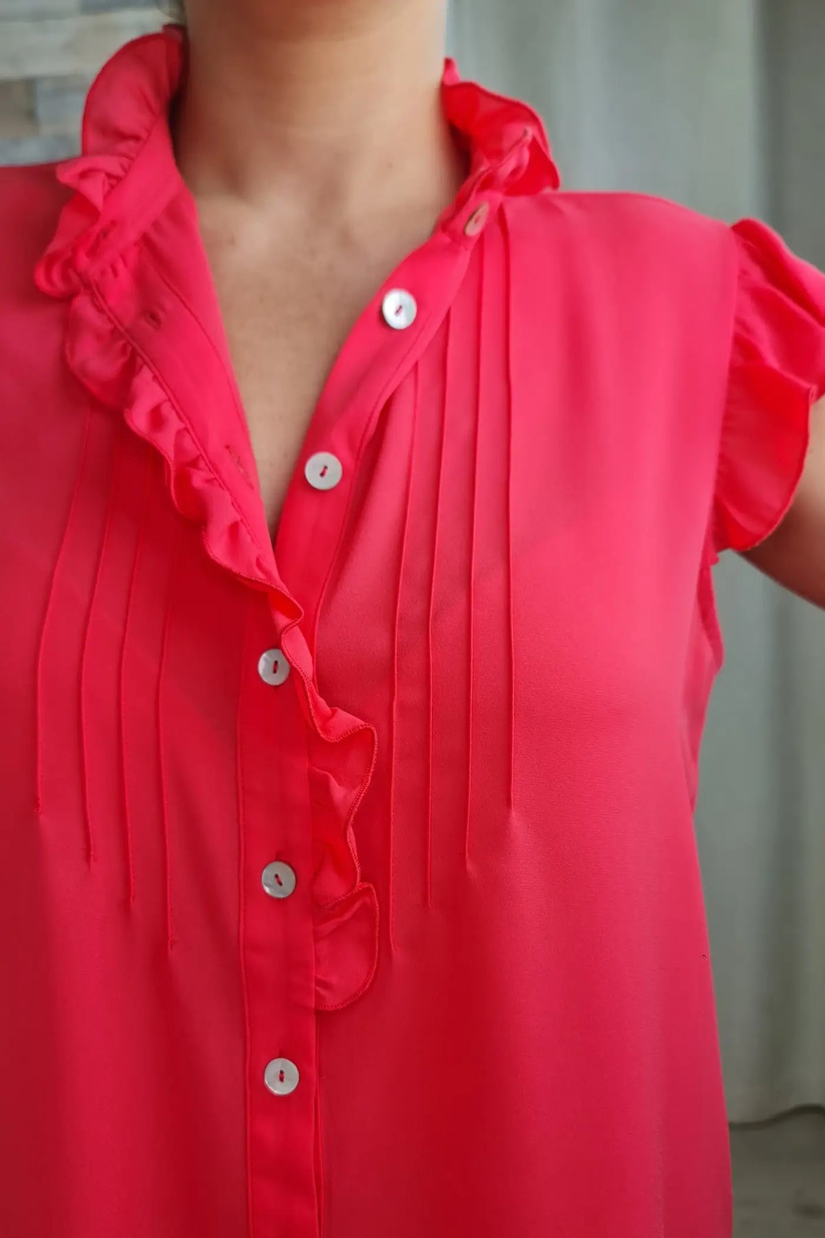 BLUSA COM MINI FOLHOS E NERVURAS CORAL