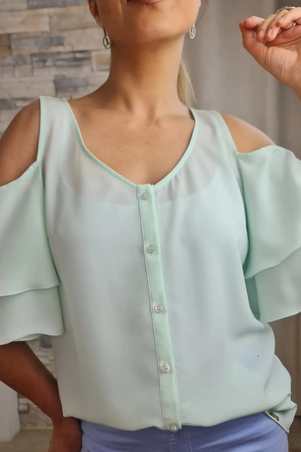 BLUSA COM OBROS DESCOBERTOS