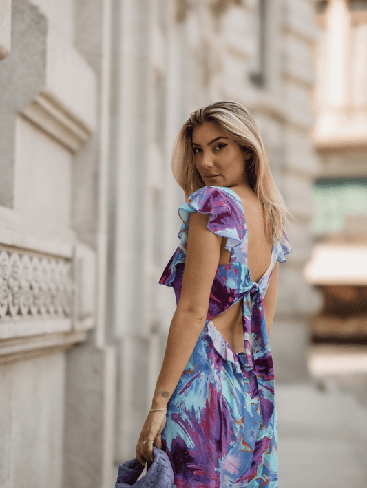 Vestido estampado com laço na costa