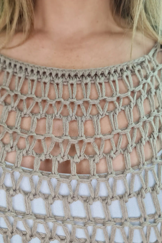 PONCHO PERFURADO AREIA